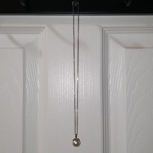 Pearl necklace on silver chain